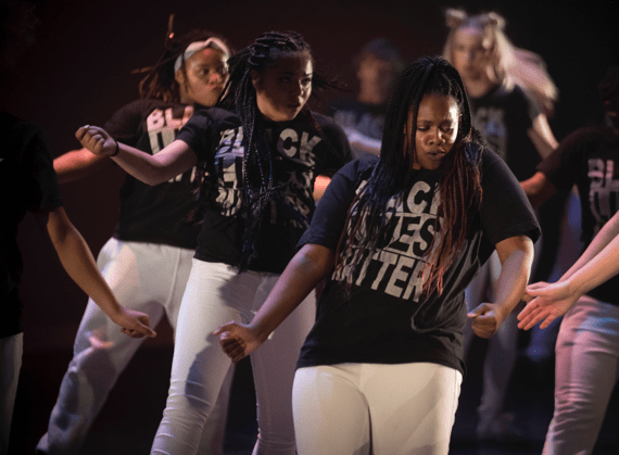 Image of the Destiny Arts Youth Performance Company dancing at a performance